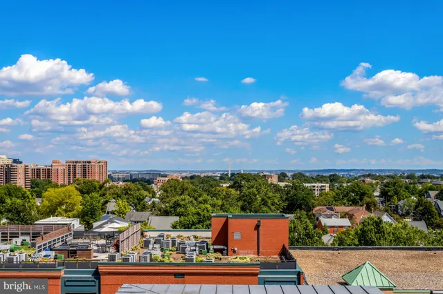 a view of roof deck with patio