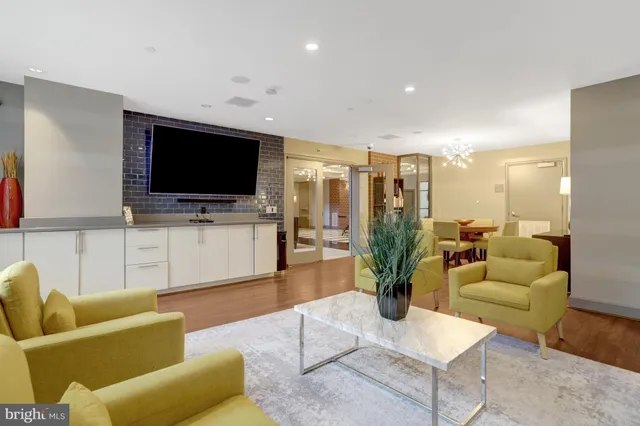 a view of a building with sitting area