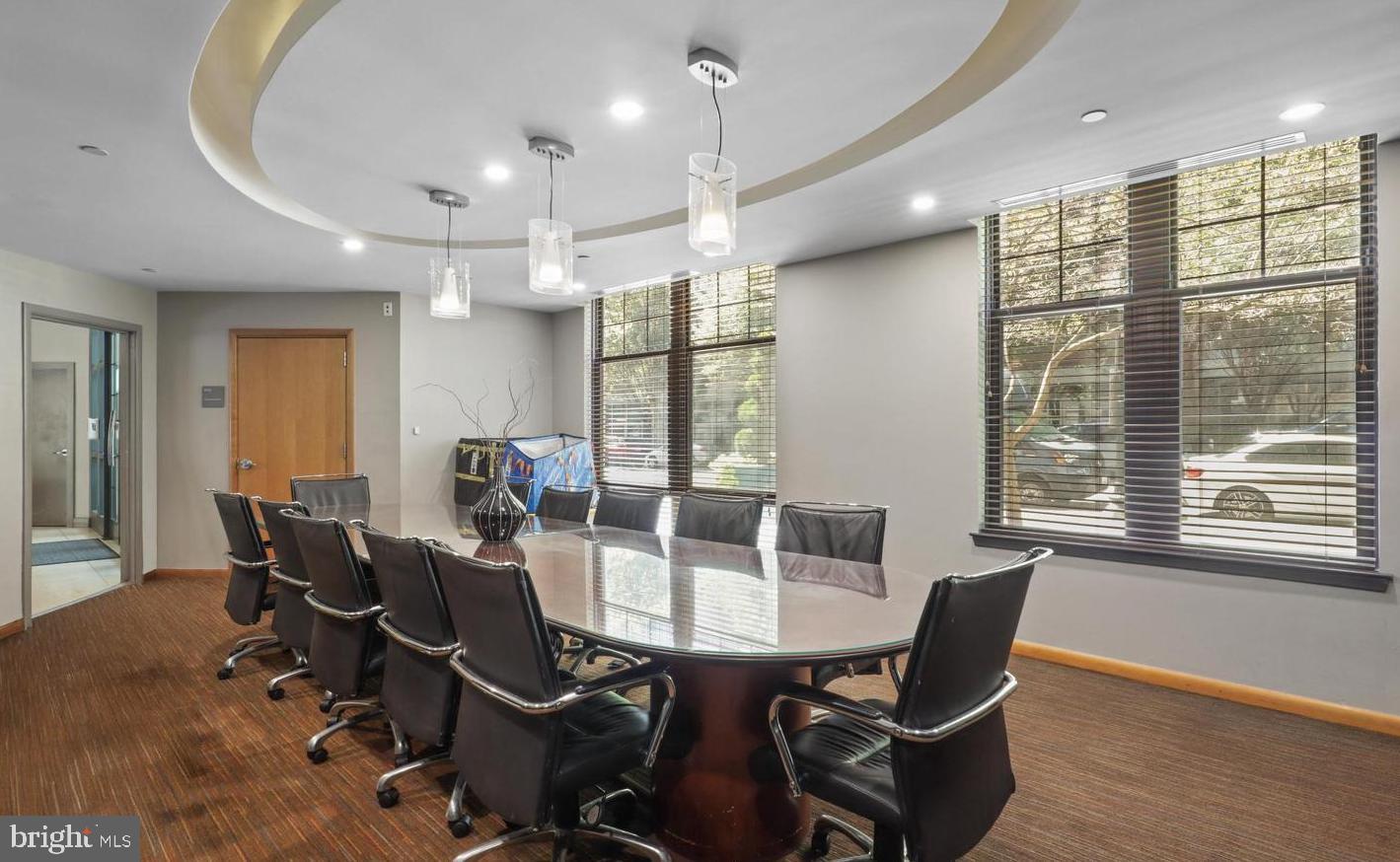 1021 North Garfield Street, Unit 914 Arlington, VA 22201 - Photo 47 of 63 a view of a dining room with furniture window and outside view