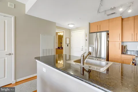 a view of a living room with a sink