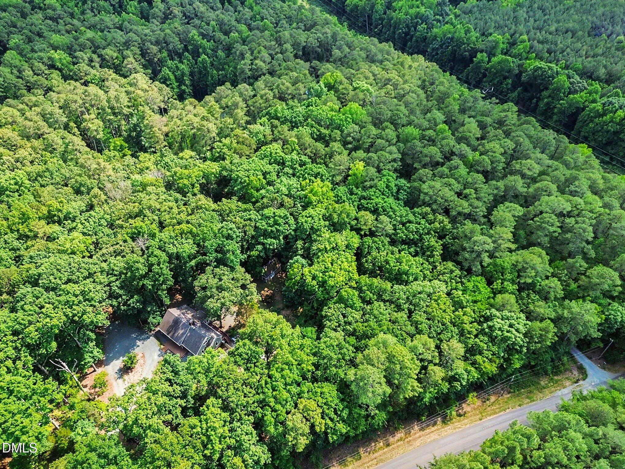 1396 Bynum Ridge Road Pittsboro, NC 27312 - Photo 4 of 36 034_dji_fly_20260624_235626_278_17823600