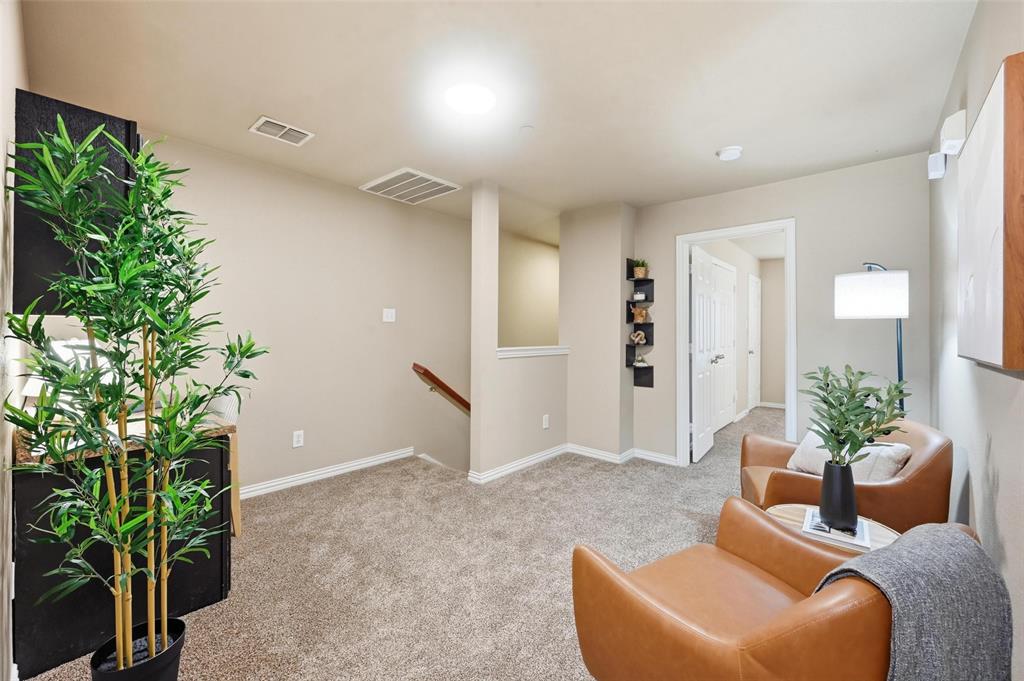 2522 Durango Ridge Drive Bedford, TX 76021 - Photo 12 of 35 Sitting room with an upstairs landing and light carpet