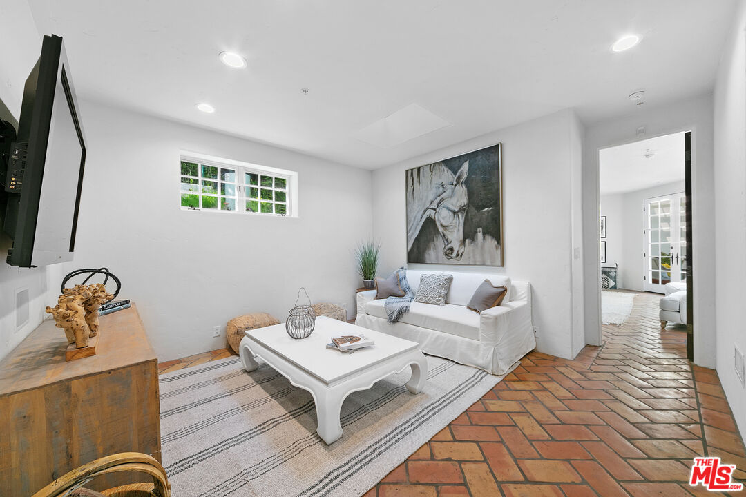 22355 Carbon Mesa Road Malibu, CA 90265 - Photo 51 of 69 a living room with furniture