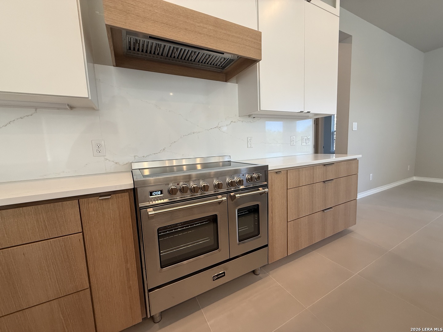 189 Mustang Lane Spring Branch, TX 78070 - Photo 11 of 53 a stove top oven sitting inside of a kitchen