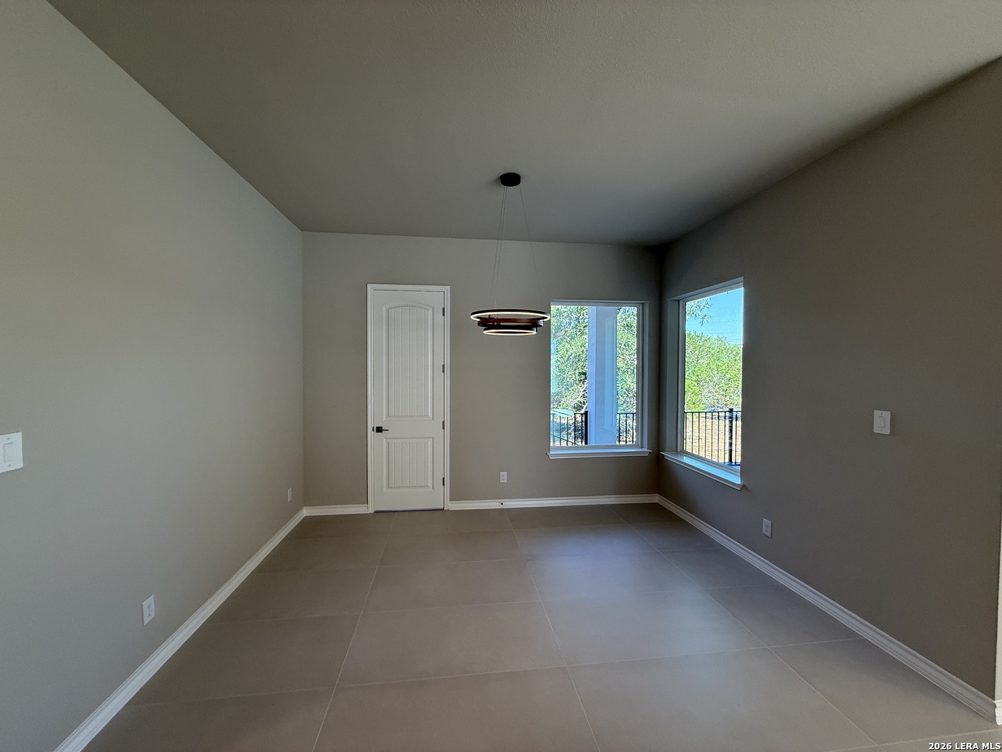 189 Mustang Lane Spring Branch, TX 78070 - Photo 14 of 53 an empty room with windows