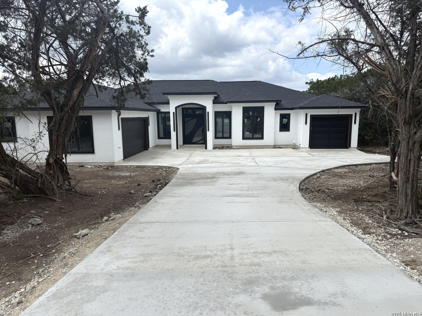 189 Mustang Lane Spring Branch, TX 78070 - Photo 2 of 53 a view of a house with a patio