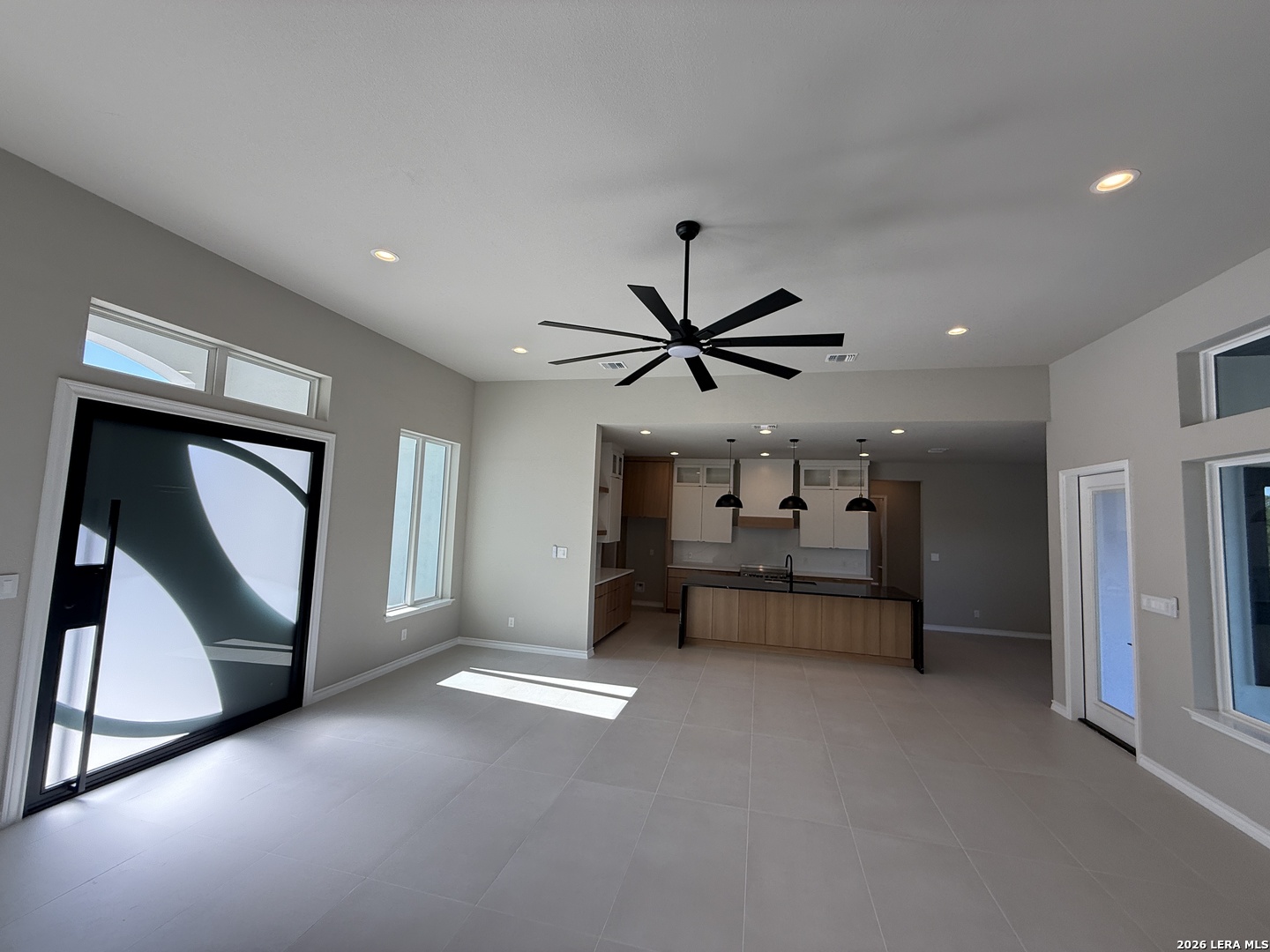 189 Mustang Lane Spring Branch, TX 78070 - Photo 21 of 53 a living room with a furniture and a ceiling fan