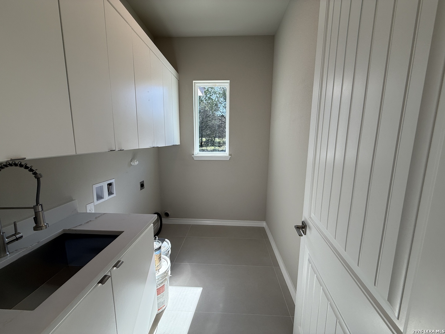 189 Mustang Lane Spring Branch, TX 78070 - Photo 25 of 53 a view of a kitchen with sink and cabinets