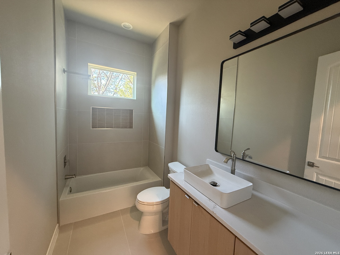 189 Mustang Lane Spring Branch, TX 78070 - Photo 42 of 53 a bathroom with a sink a toilet and shower