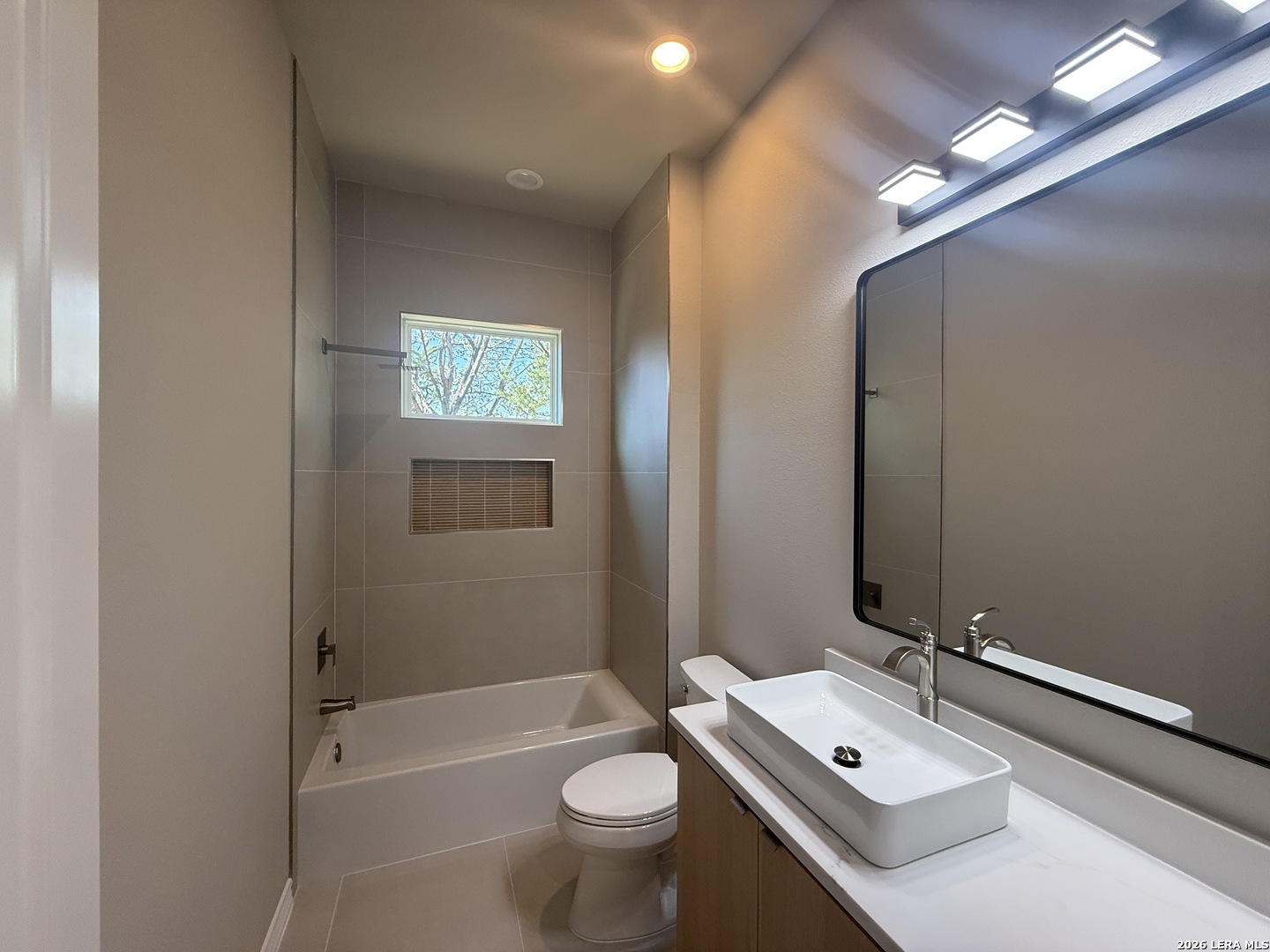 189 Mustang Lane Spring Branch, TX 78070 - Photo 44 of 53 a bathroom with a sink a toilet and shower