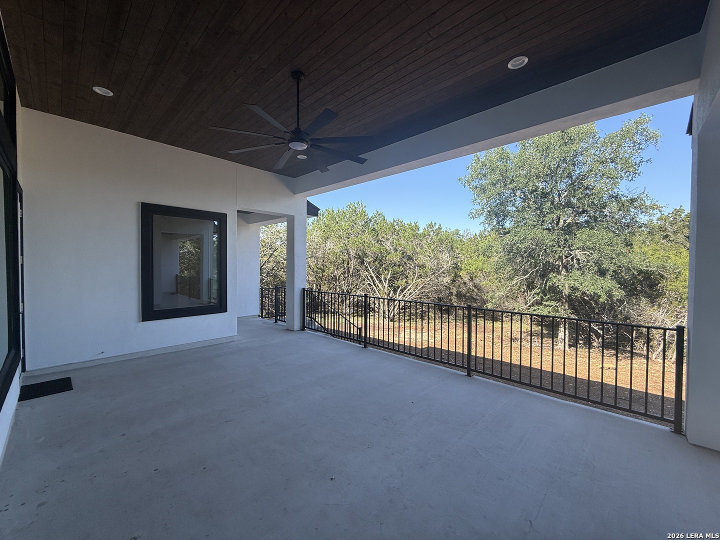 189 Mustang Lane Spring Branch, TX 78070 - Photo 49 of 53 a view of a room with balcony and furniture