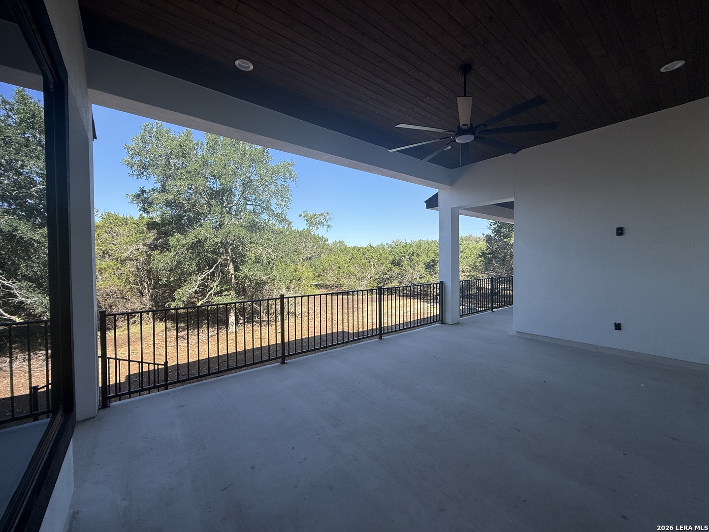 189 Mustang Lane Spring Branch, TX 78070 - Photo 50 of 53 a view of a room with wooden floor and balcony