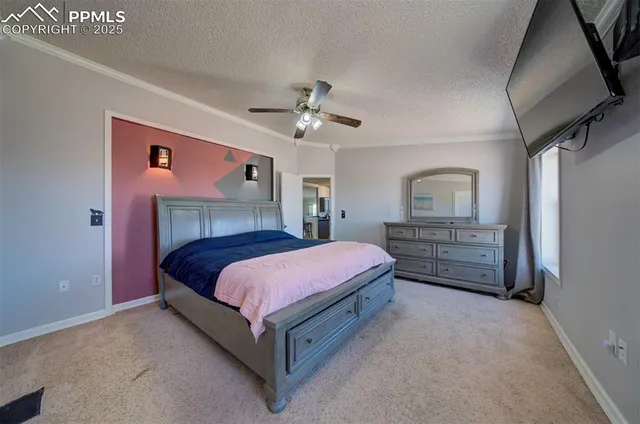 a bathroom with a granite countertop sink a mirror and a toilet