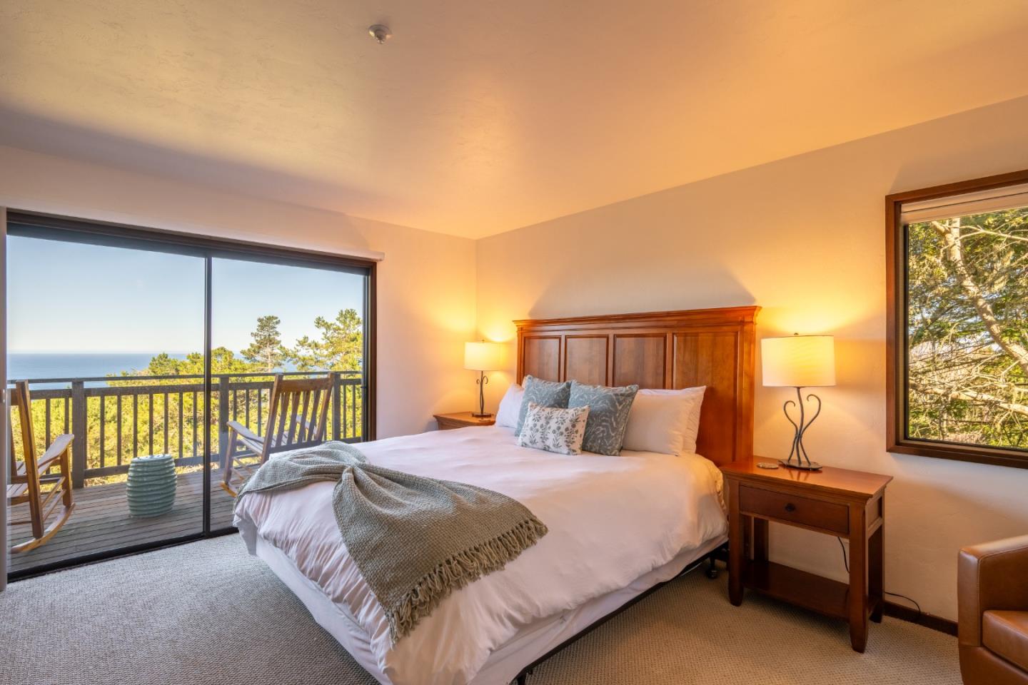 214 Crest Road Carmel, CA 93923 - Photo 18 of 29 a bedroom with a bed and a balcony view