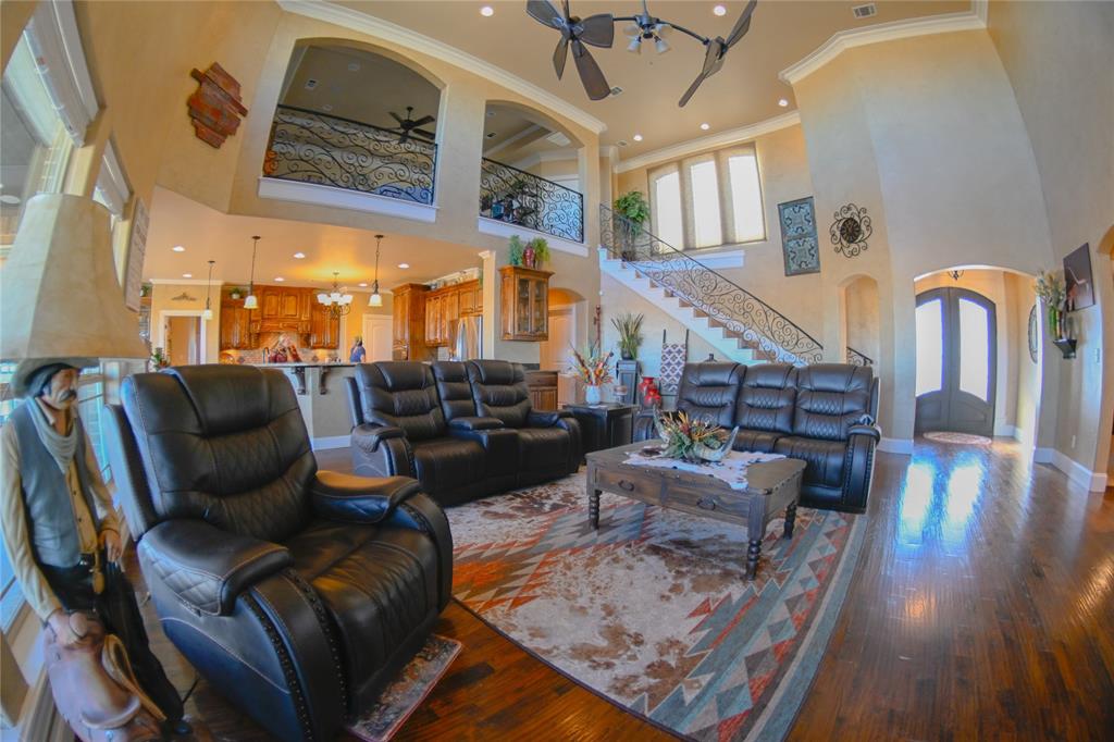 1397 Cr 338 Gainesville Tx 76240 Gainesville, TX 76240 - Photo 15 of 36 a living room with furniture and wooden floor