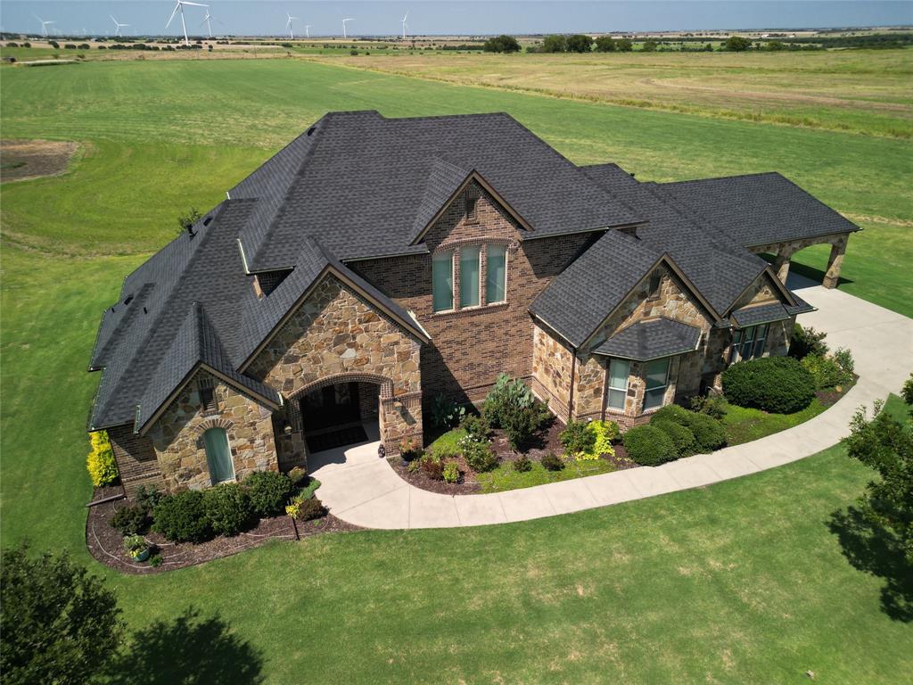 1397 Cr 338 Gainesville Tx 76240 Gainesville, TX 76240 - Photo 2 of 36 a aerial view of a house with a garden and lake view