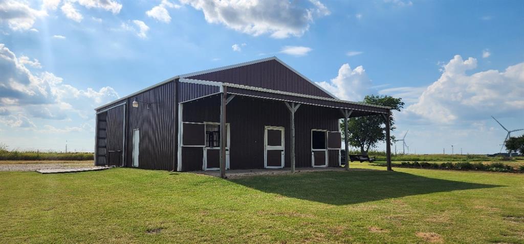 1397 Cr 338 Gainesville Tx 76240 Gainesville, TX 76240 - Photo 27 of 36 a view of a house with a yard