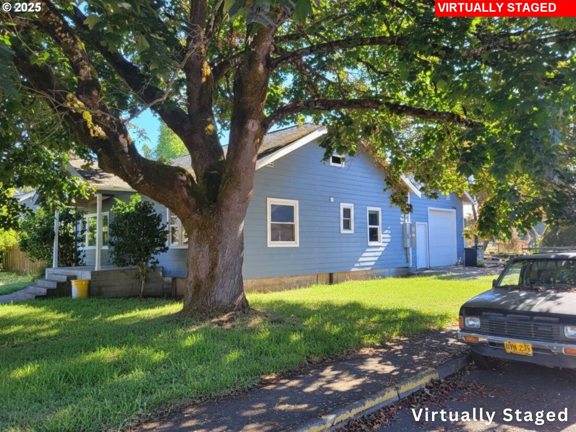 431 Southwest 3rd Avenue Canby, OR 97013 - Photo 12 of 14 a view of a house with a yard