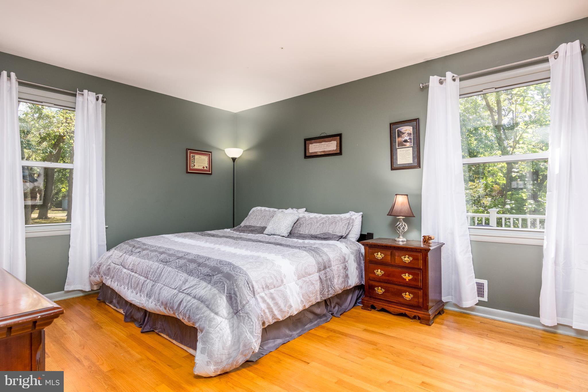 410 Edgewater Road Pasadena, MD 21122 - Photo 13 of 26 Master Bedroom with Half Bath