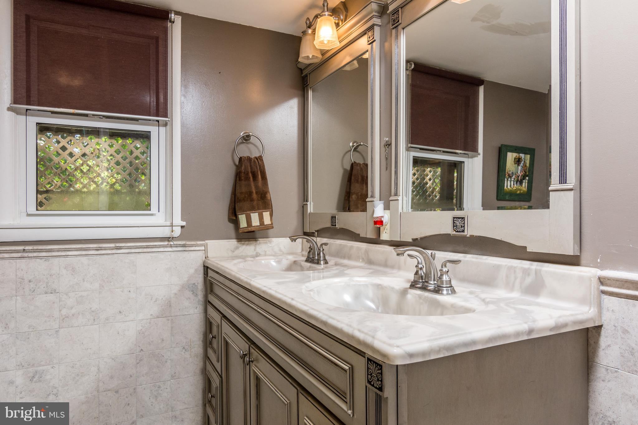 410 Edgewater Road Pasadena, MD 21122 - Photo 18 of 26 Basement Full Bath Ceramic Tile