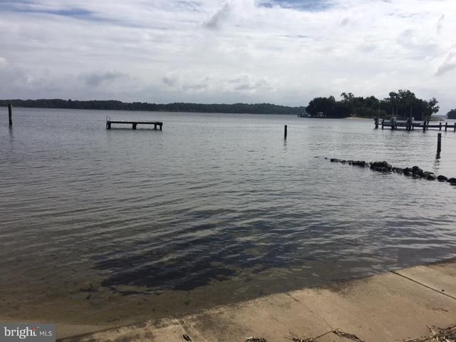 410 Edgewater Road Pasadena, MD 21122 - Photo 24 of 26 Community Beach w/Floating Dock