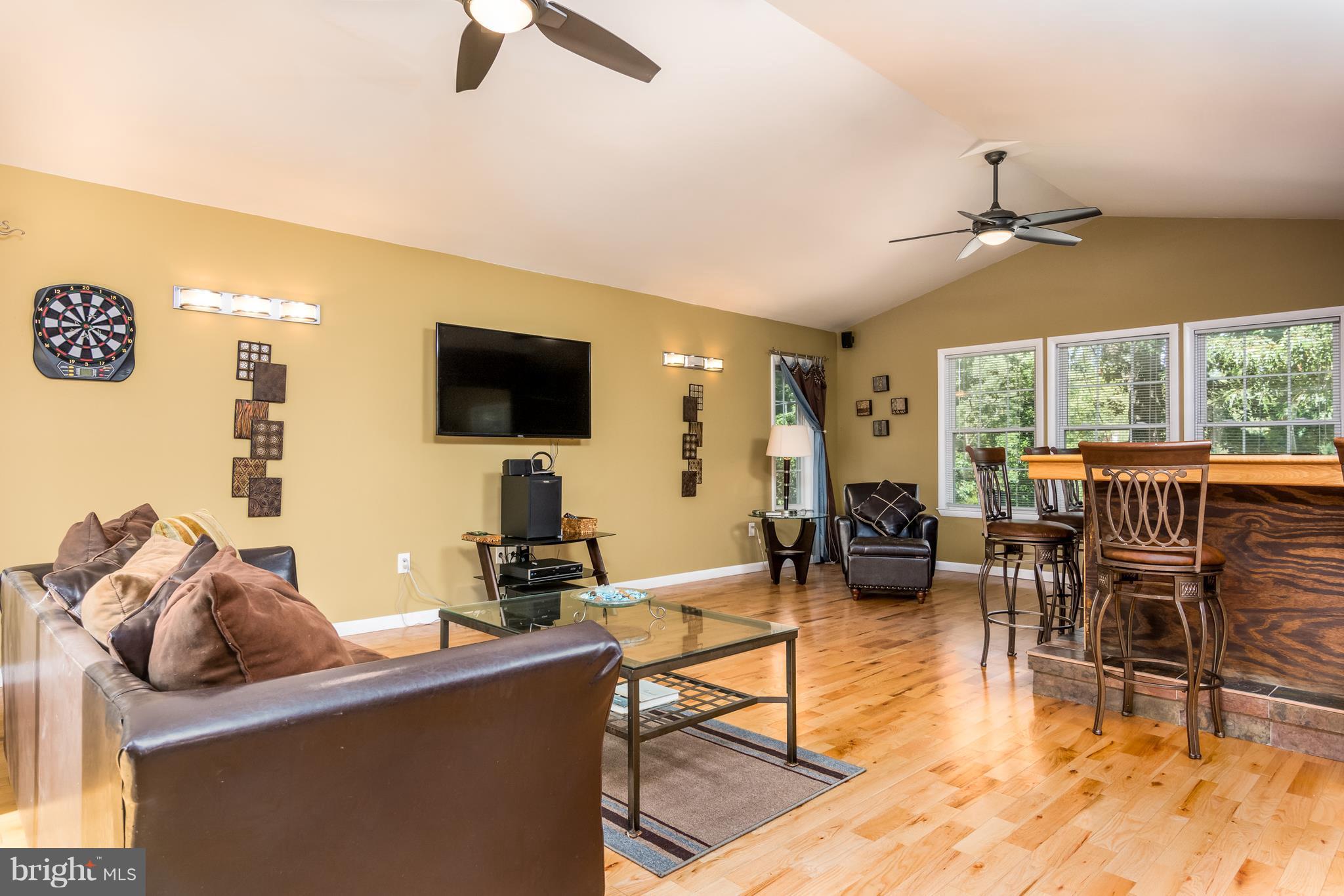 410 Edgewater Road Pasadena, MD 21122 - Photo 4 of 26 Large Family Room w/Bar Entertainment Area