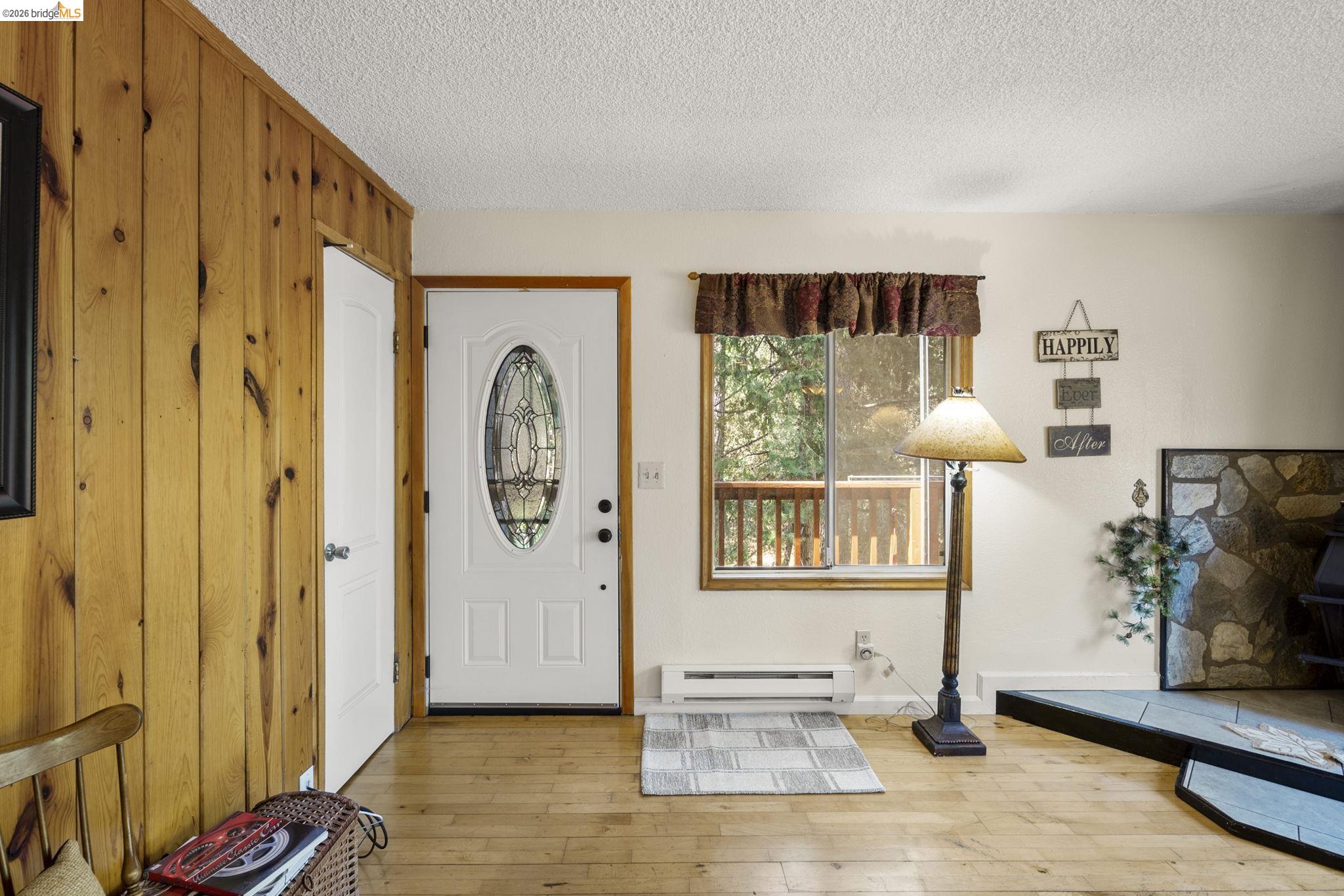 21931 Glenwood Road Sonora, CA 95370 - Photo 11 of 42 a view of livingroom with furniture and windows