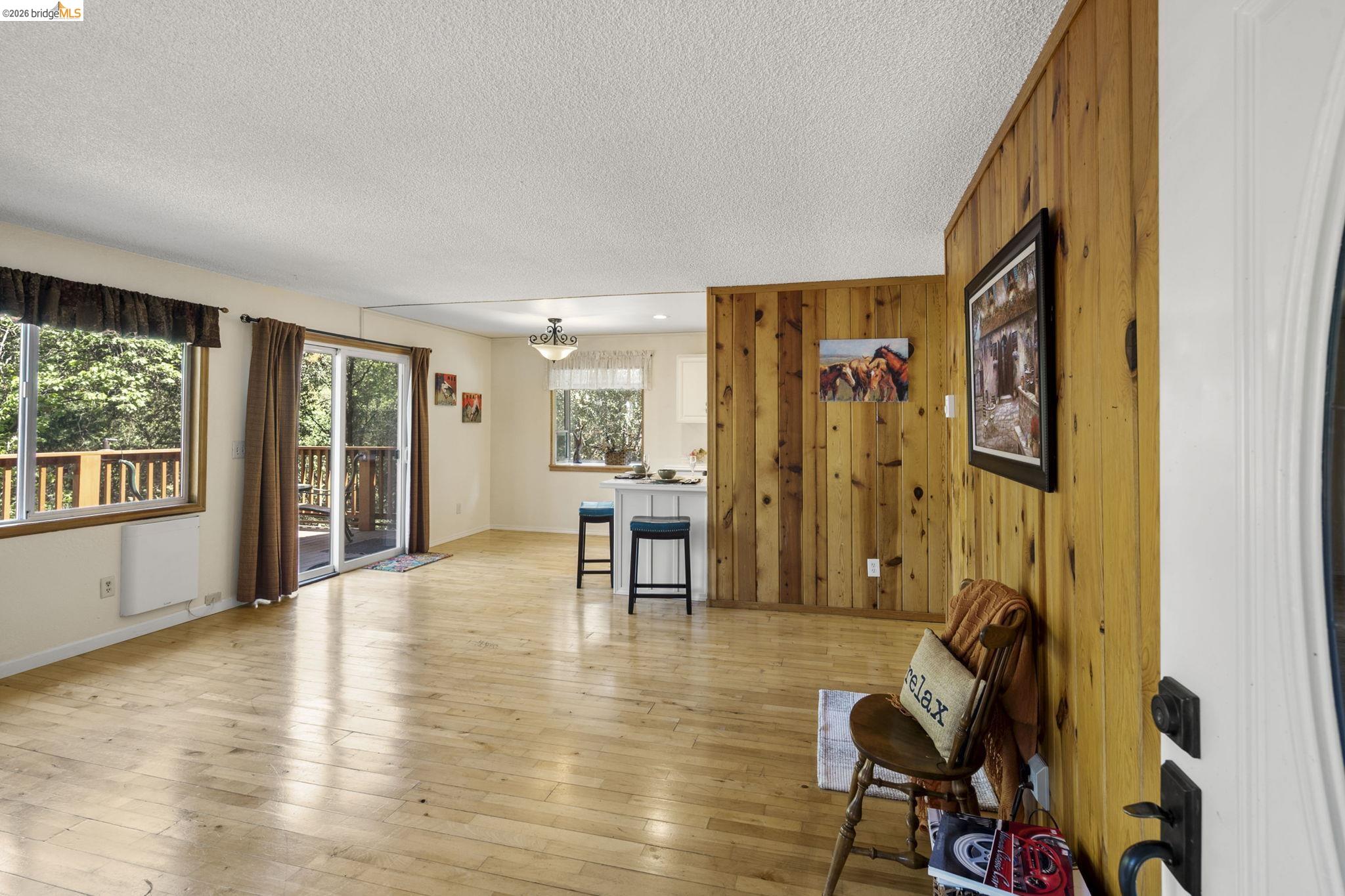 21931 Glenwood Road Sonora, CA 95370 - Photo 13 of 42 a view of a livingroom with furniture window and wooden floor