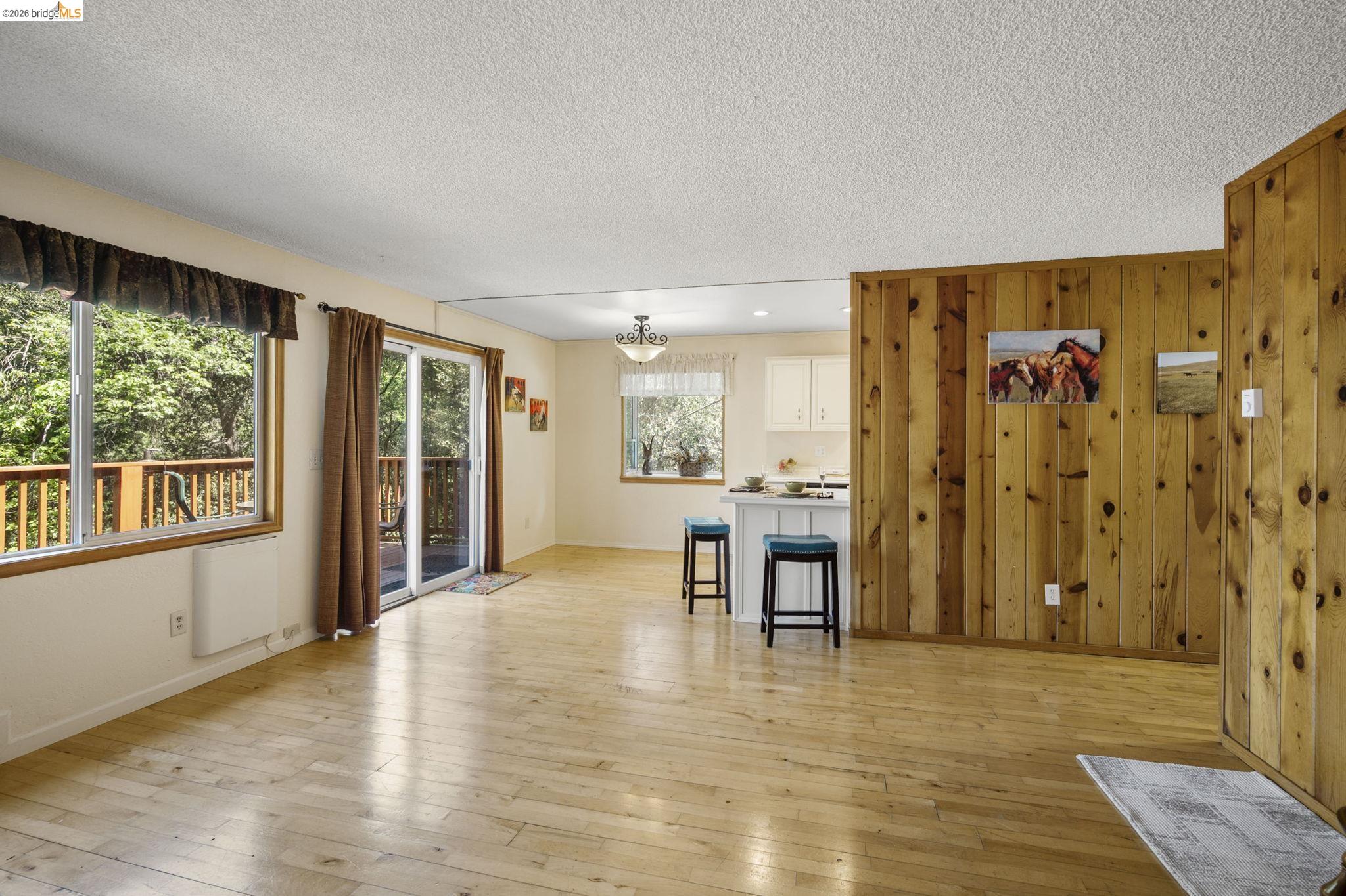 21931 Glenwood Road Sonora, CA 95370 - Photo 14 of 42 a view of a livingroom with furniture window and wooden floor