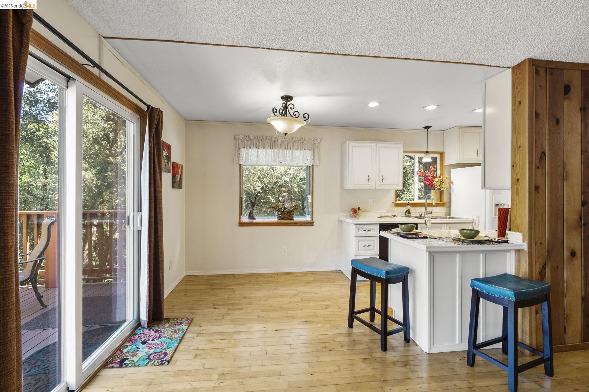 21931 Glenwood Road Sonora, CA 95370 - Photo 16 of 42 a view of kitchen with cabinets and wooden floor
