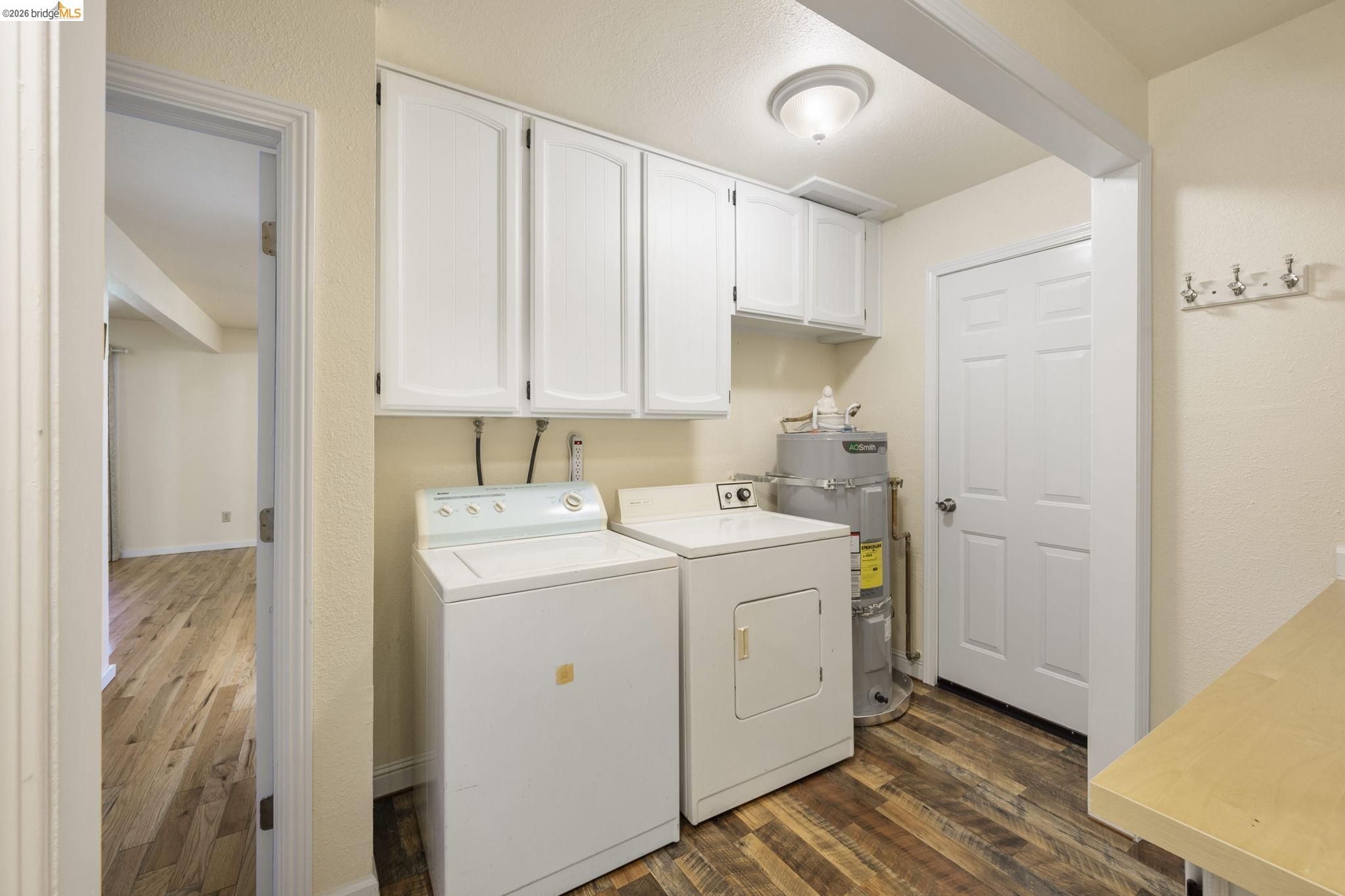 21931 Glenwood Road Sonora, CA 95370 - Photo 29 of 42 a view of a storage and utility room with a washer dryer