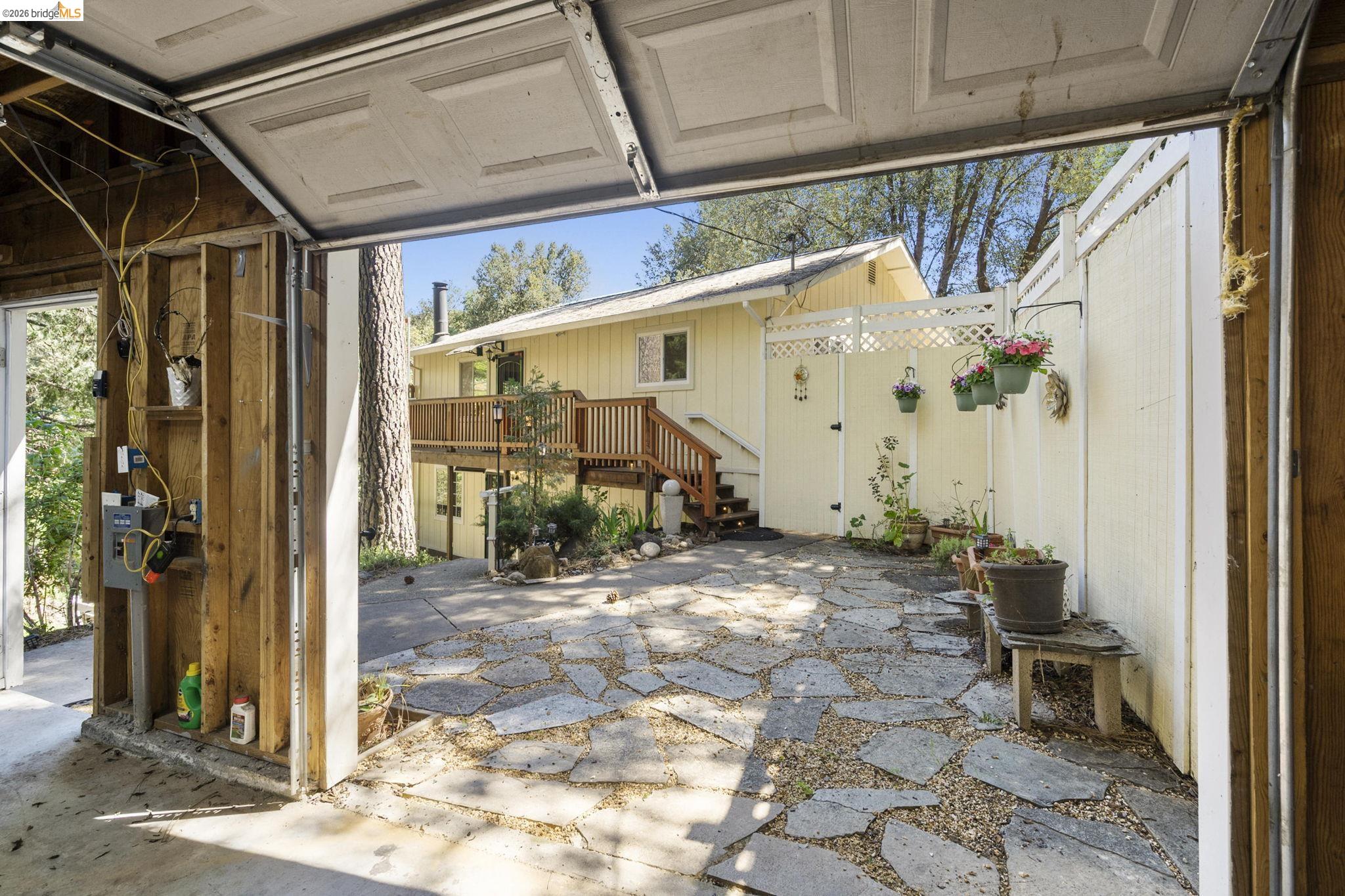 21931 Glenwood Road Sonora, CA 95370 - Photo 30 of 42 a view of a porch with seating space
