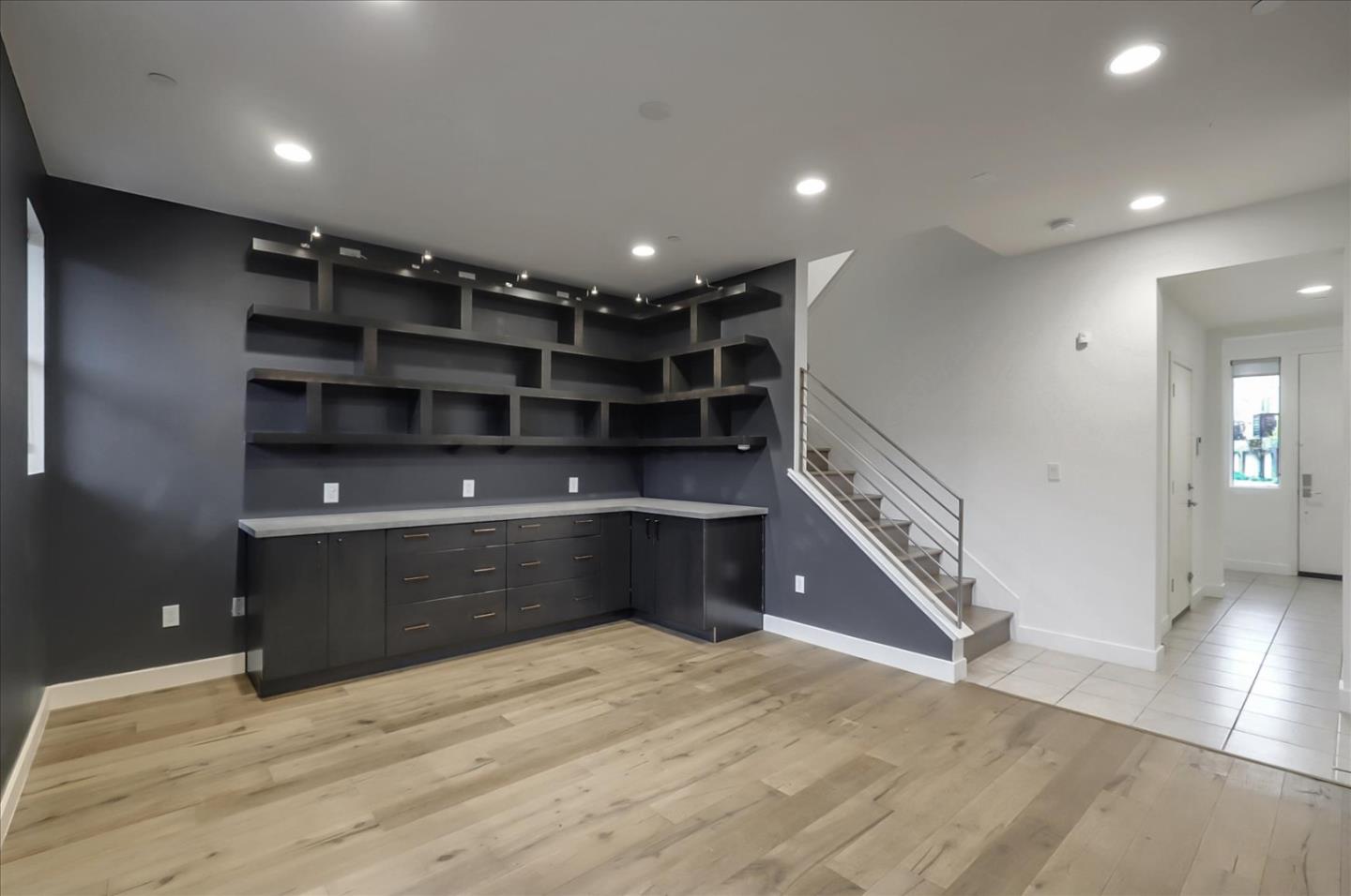 1405 Pullman Way Oakland, CA 94607 - Photo 12 of 36 a room with lots of wooden cabinets