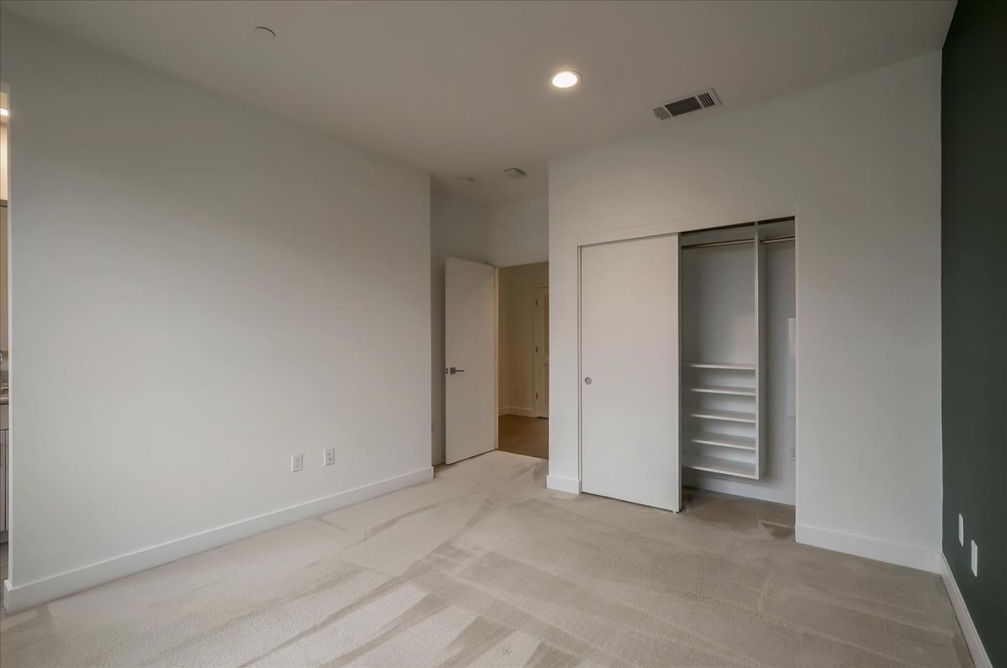 1405 Pullman Way Oakland, CA 94607 - Photo 26 of 36 an empty room with closet and a window
