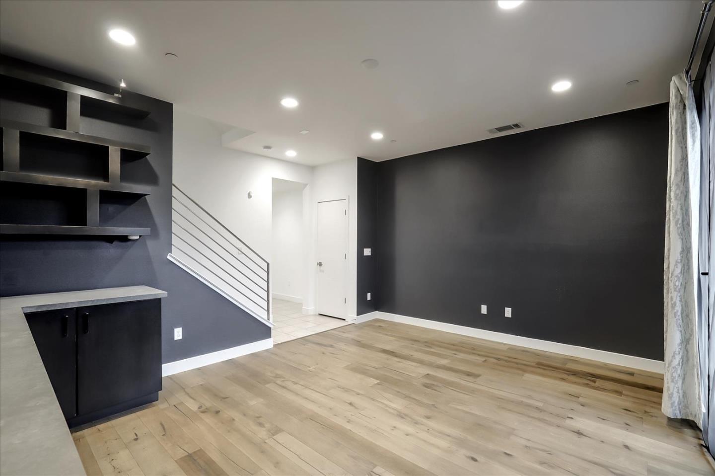 1405 Pullman Way Oakland, CA 94607 - Photo 8 of 36 a view of empty room with wooden floor