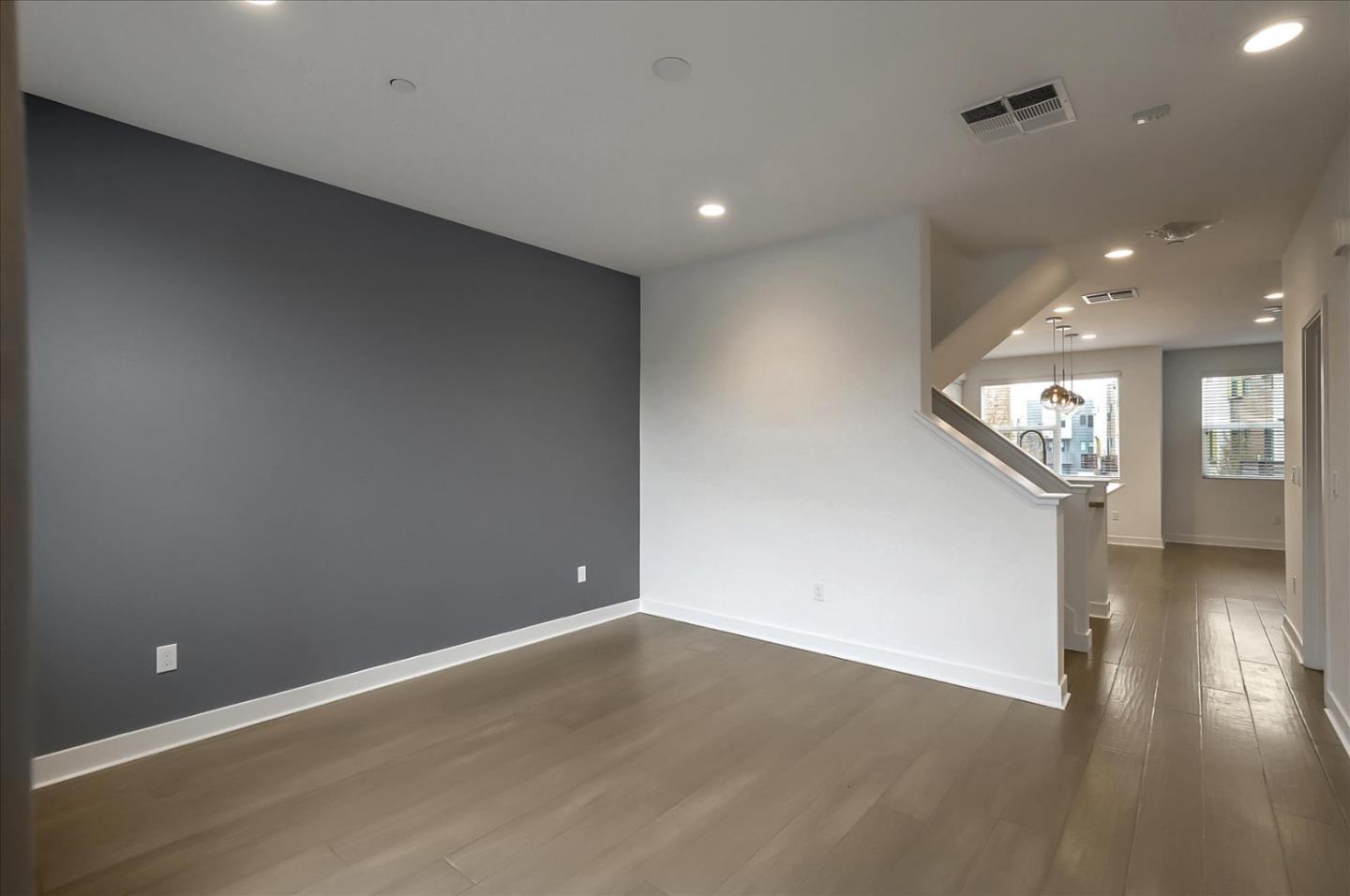 1405 Pullman Way Oakland, CA 94607 - Photo 9 of 36 an empty room with wooden floor and entrance