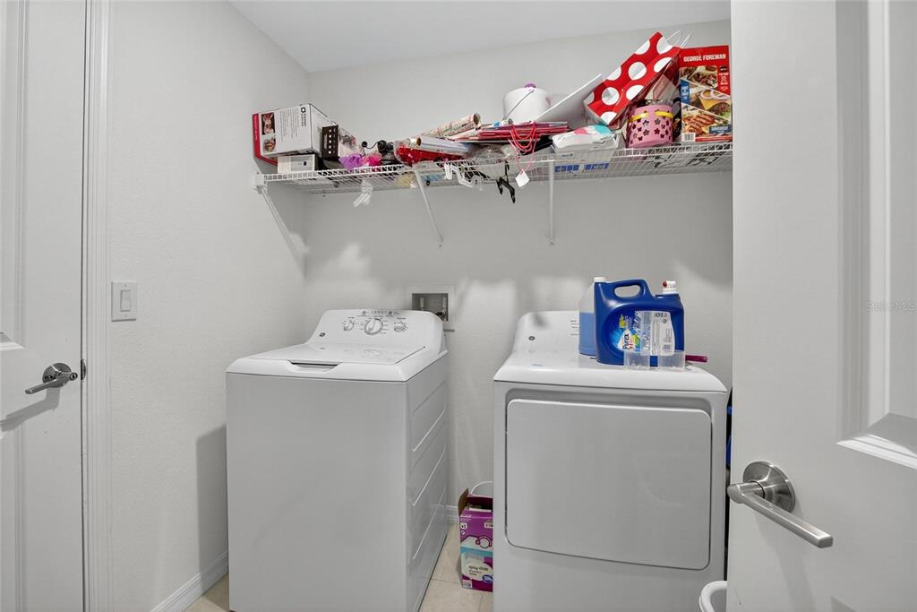1748 Red Loop Lakeland, FL 33801 - Photo 18 of 66 a utility room with dryer and washer