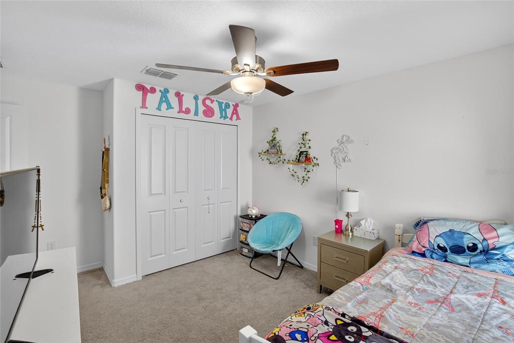 1748 Red Loop Lakeland, FL 33801 - Photo 33 of 66 a living room with furniture and a table