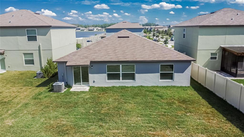 1748 Red Loop Lakeland, FL 33801 - Photo 42 of 66 a front view of a house with garden