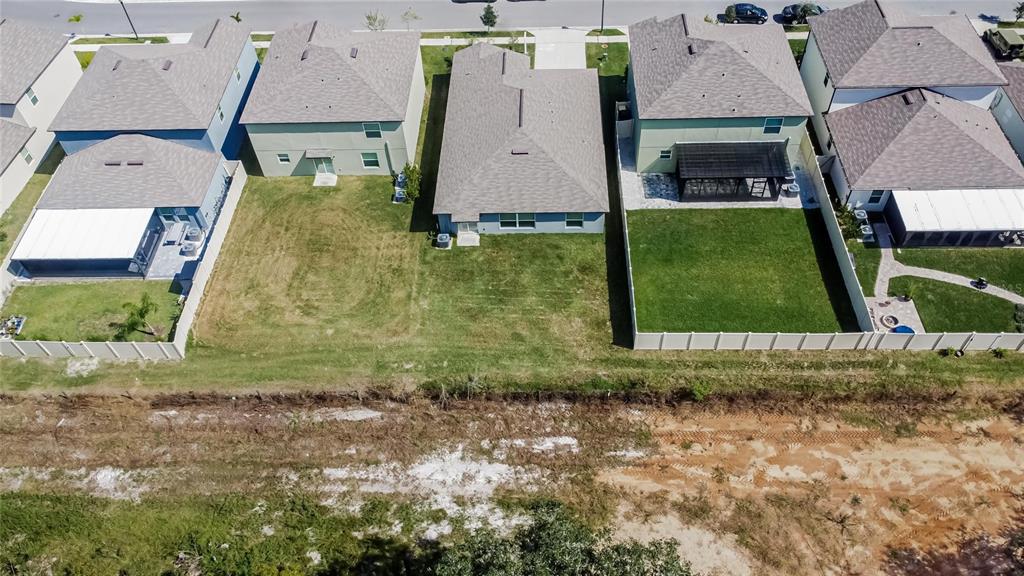 1748 Red Loop Lakeland, FL 33801 - Photo 44 of 66 an aerial view of residential houses with outdoor space and parking
