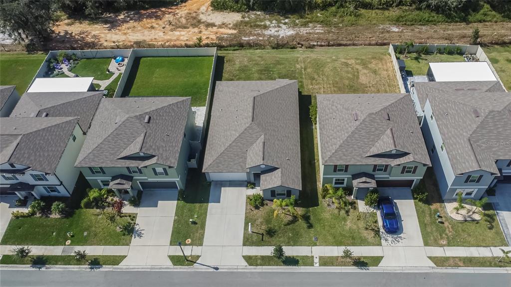 1748 Red Loop Lakeland, FL 33801 - Photo 55 of 66 an aerial view of houses with outdoor space and swimming pool