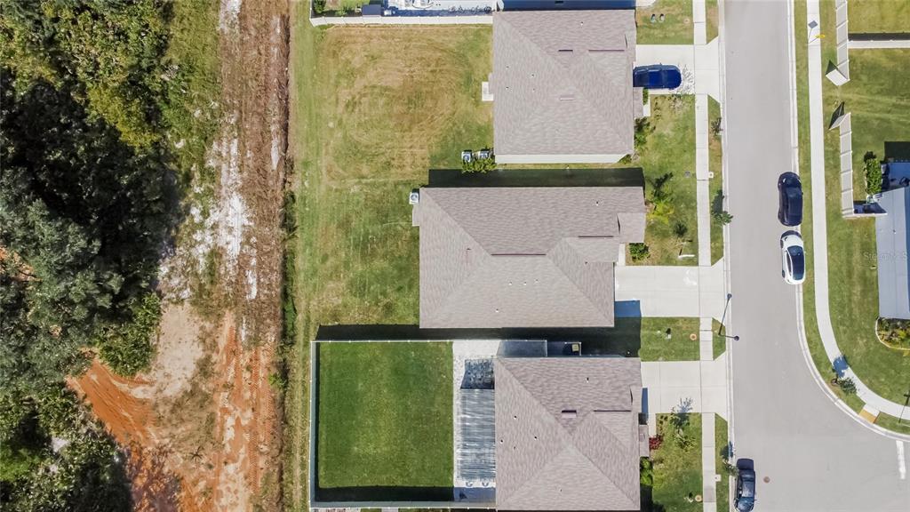 1748 Red Loop Lakeland, FL 33801 - Photo 65 of 66 an aerial view of residential houses with outdoor space