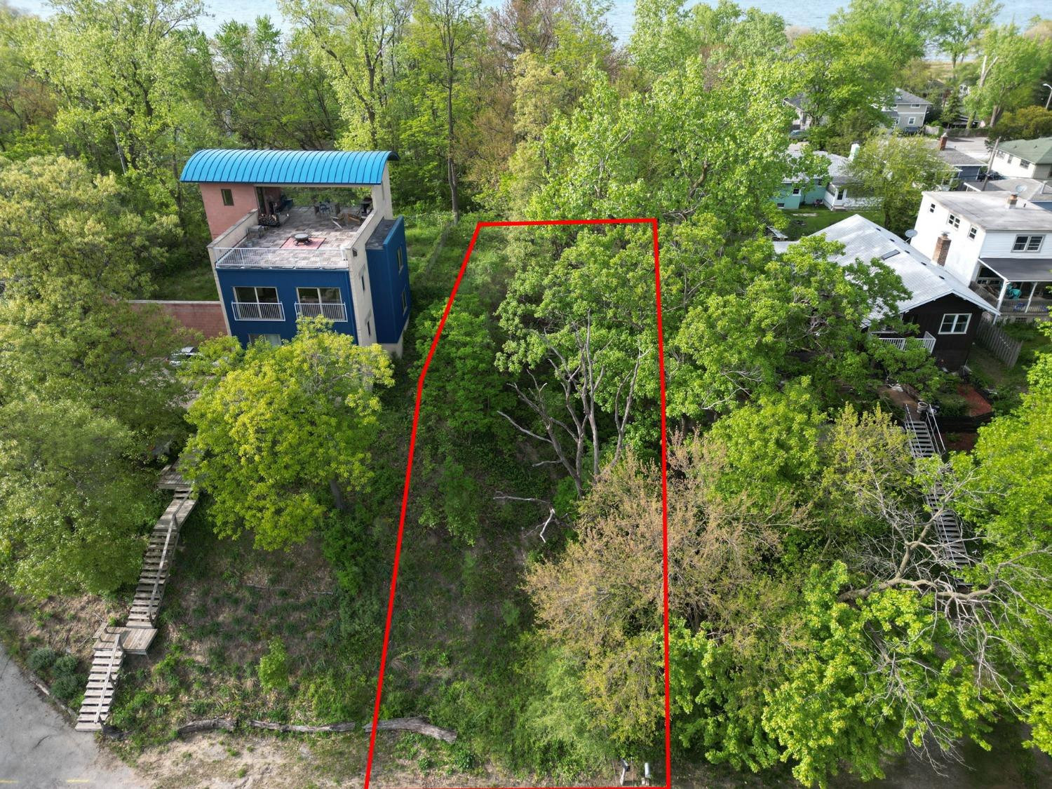 7632 Maple Avenue Gary, IN 46403 - Photo 2 of 8 a view of a house with a yard and sitting area