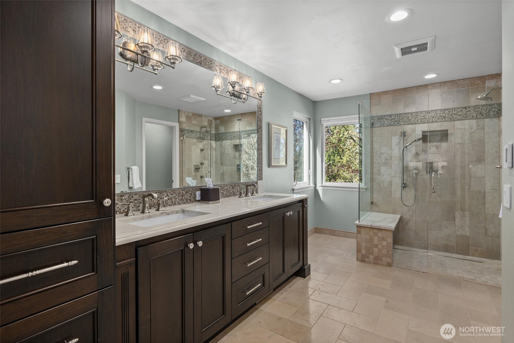 2708 204th Street Southeast Bothell, WA 98021 - Photo 27 of 40 a bathroom with a granite countertop sink mirror and shower