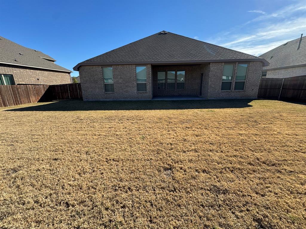 3432 Cornerstone Lane Midlothian, TX 76065 - Photo 4 of 40 a front view of a house with a yard
