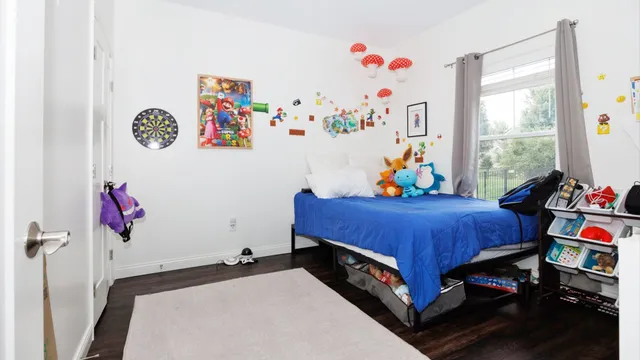 a room with furniture and a wooden floor