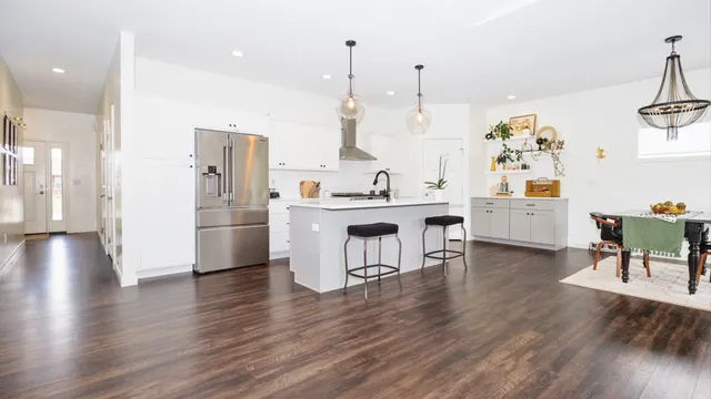 a view of a kitchen and dining room