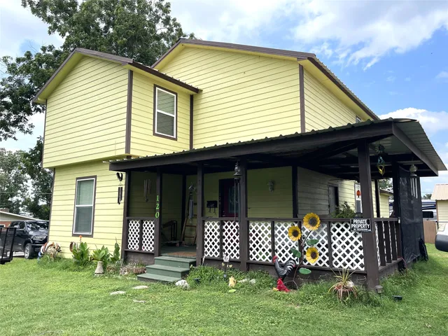 a front view of a house having yard