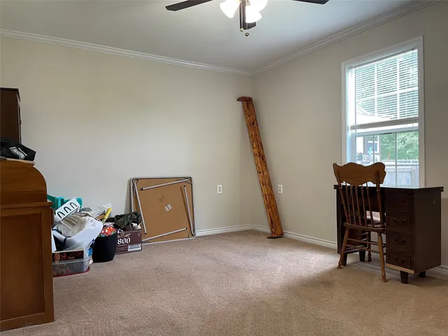 a view of workspace with furniture and windows