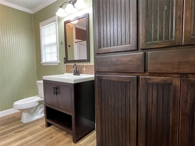a bathroom with a sink and a toilet